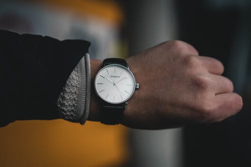 close up of a watch on a wrist