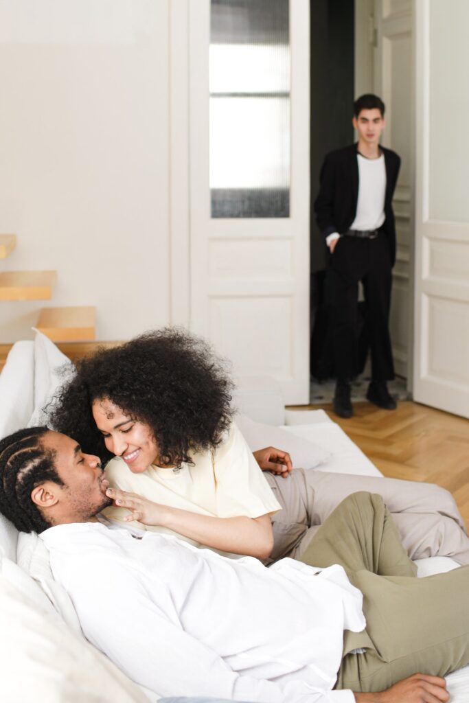 man walking in on wife with someone else